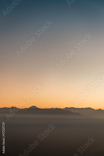 Aerial view of sunset over mountains, Metropolitan Region, Chile