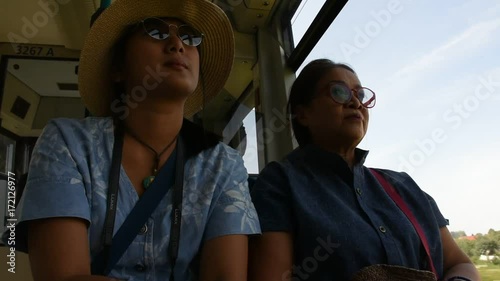 Thai women people sitting on bus from Sandhausen district go to Heidelberg altstadt or old town for travel and shopping in Heidelberg, Germany photo