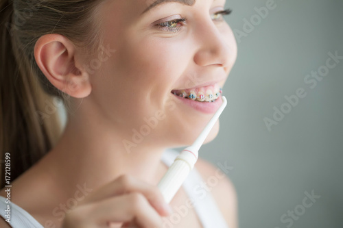 Woman brushing her teeth 