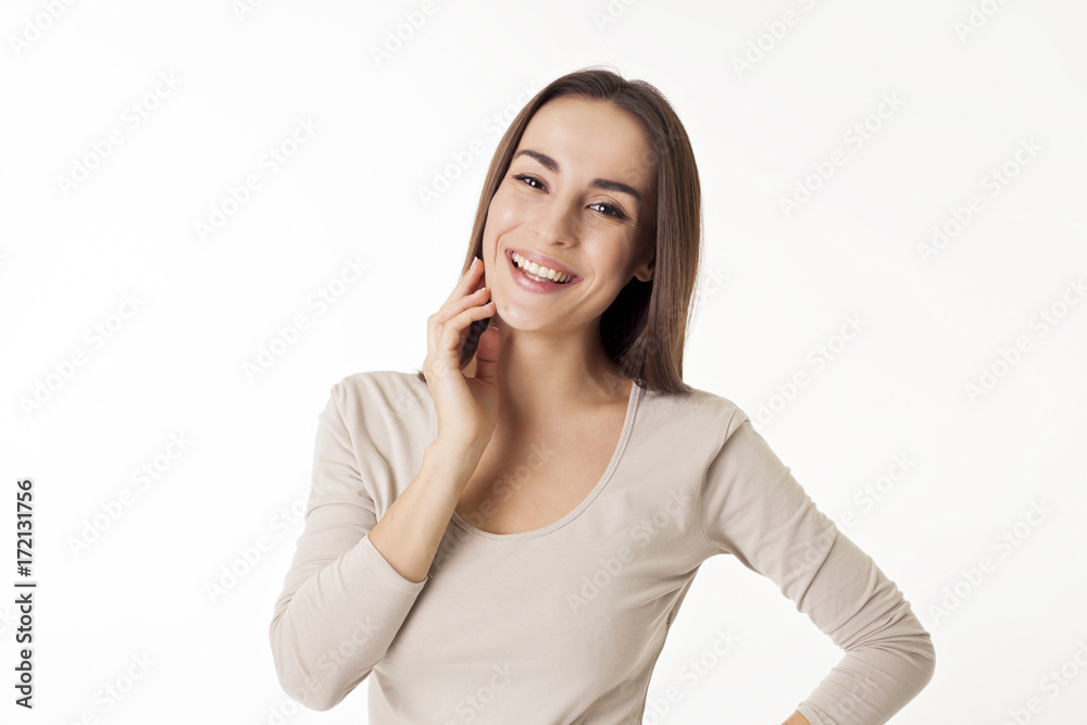 Portrait of a cheerful and beautiful girl with copy space. Isolated on white Portrait of a cheerful and beautiful girl with copy space. Isolated on white