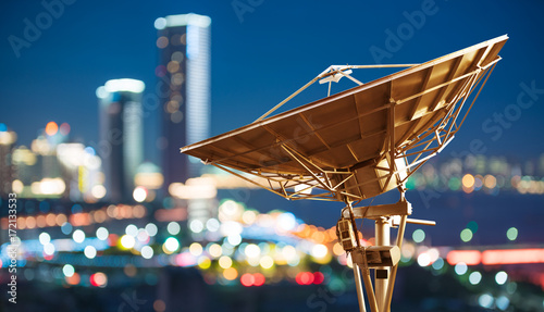 Photography In the city night background large satellite antenna