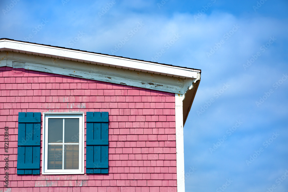 PInk house against blue sky