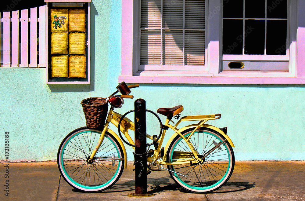 Bicycle parked on a city street near 