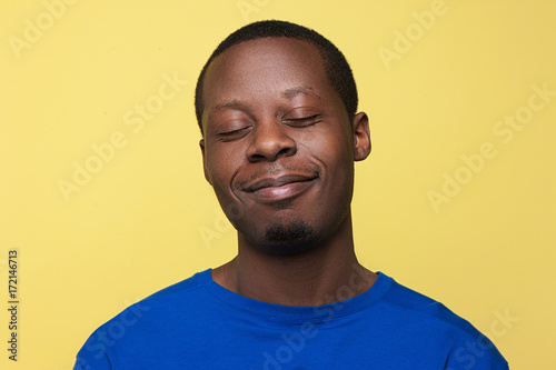 Canvas Print Satisfied young black man