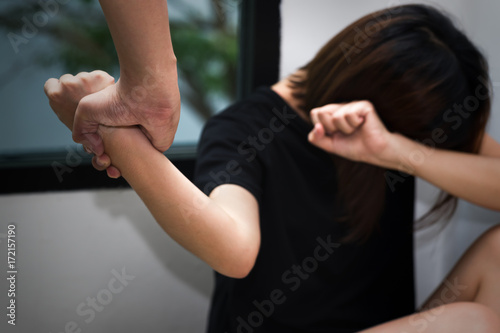 Εκτύπωση καμβά Man jerk wife or woman hands on the floor - crime and violence concept