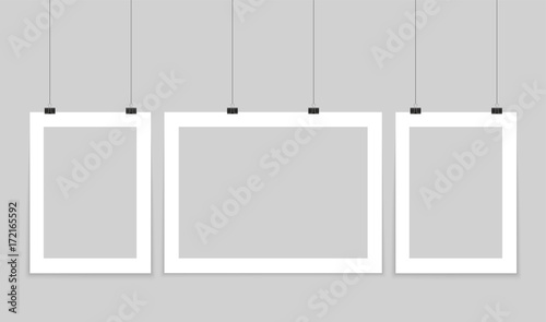 Poster mockup. Vector mock up blank paper hanging on office clip. Paper gallery set on white background