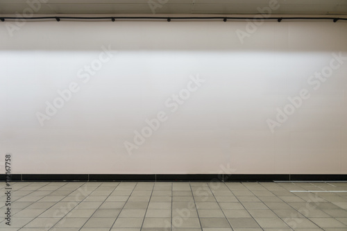 Large blank billboard on a street wall, banners with room to add your own text © RobbinLee