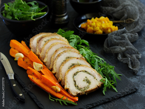 Fried pork loin stuffed with herbs and cheese.