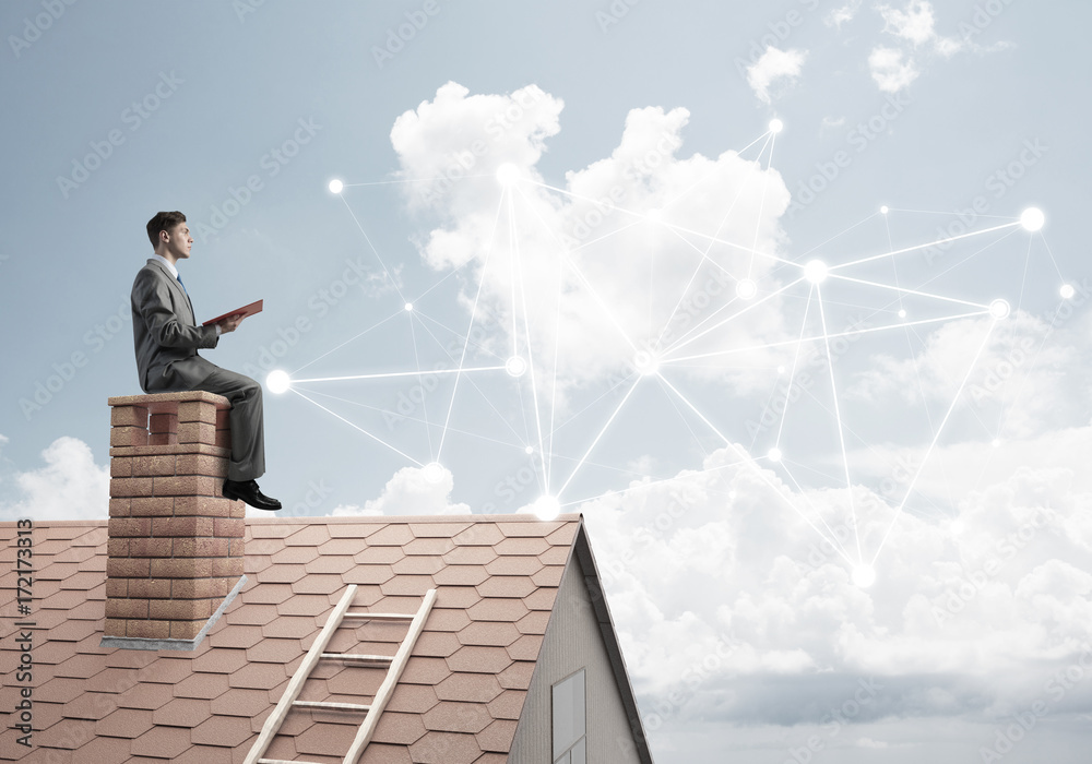 Man reading book and concept of social connection in sky Man reading book and concept of social connection in sky