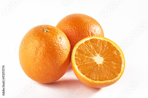 Delicious fresh oranges isolated on white background.