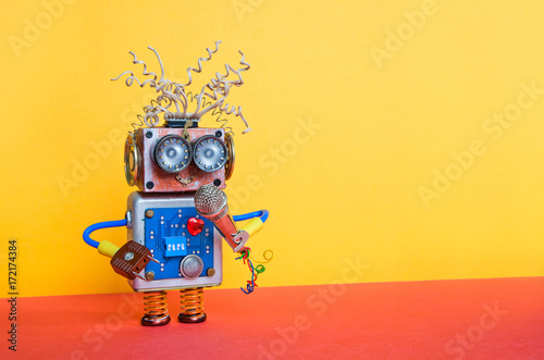 Friendly entertainer robot with microphone. Music lecture performance poster design. Smiley face cyborg toy, yellow wall red ground decoration background.