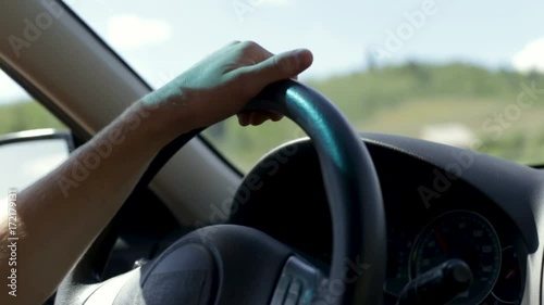 Wallpaper Mural Closeup Of Man's Hand On Steering Wheel, In Moving Car, As He Drives Through Utah Torontodigital.ca