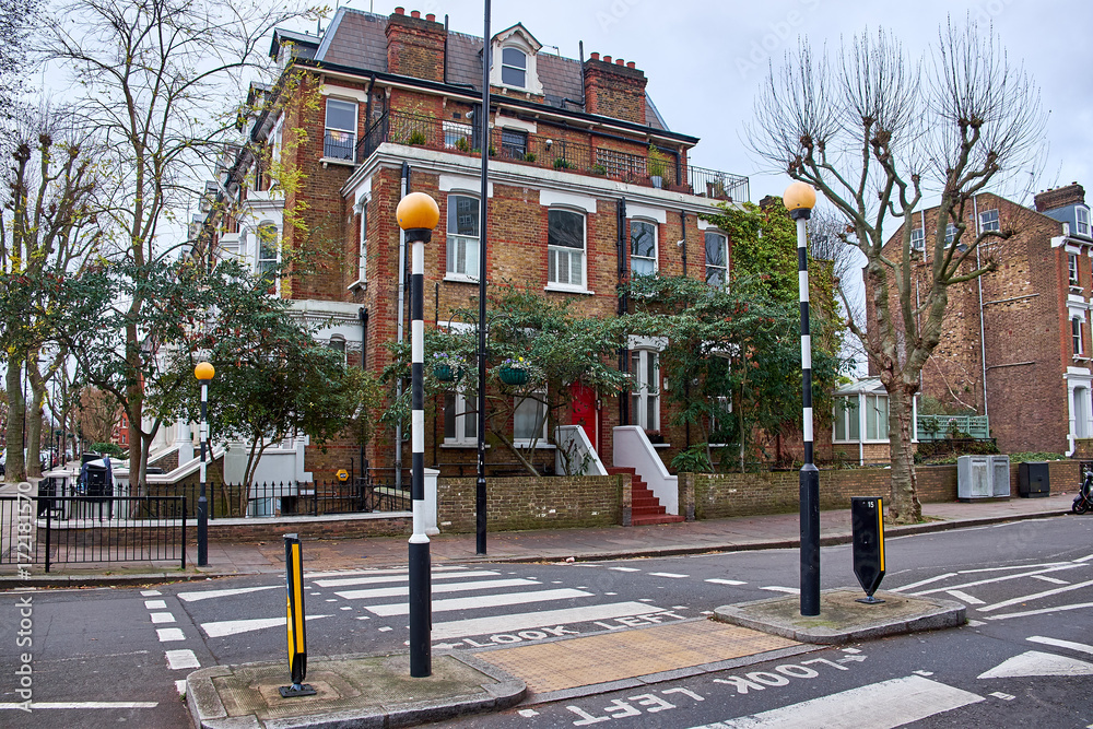 Obraz premium Zebra crossing and the words Look Left, written on the asphalt in Paddington, London