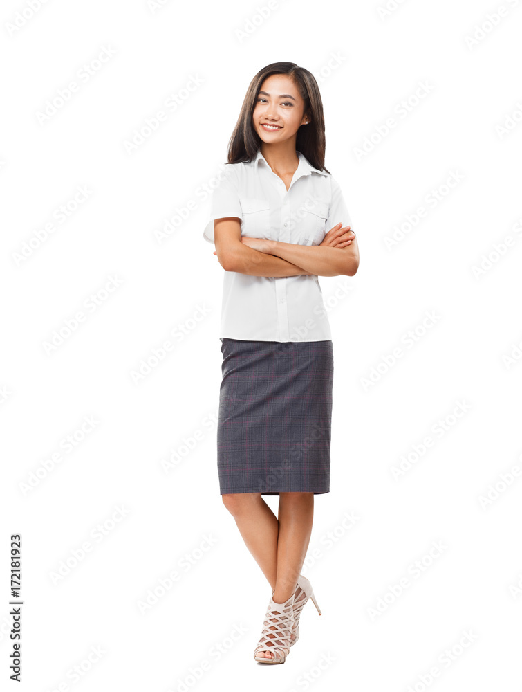 Young smiling Asian woman in full length with crossed arms Young smiling Asian woman in full length with crossed arms