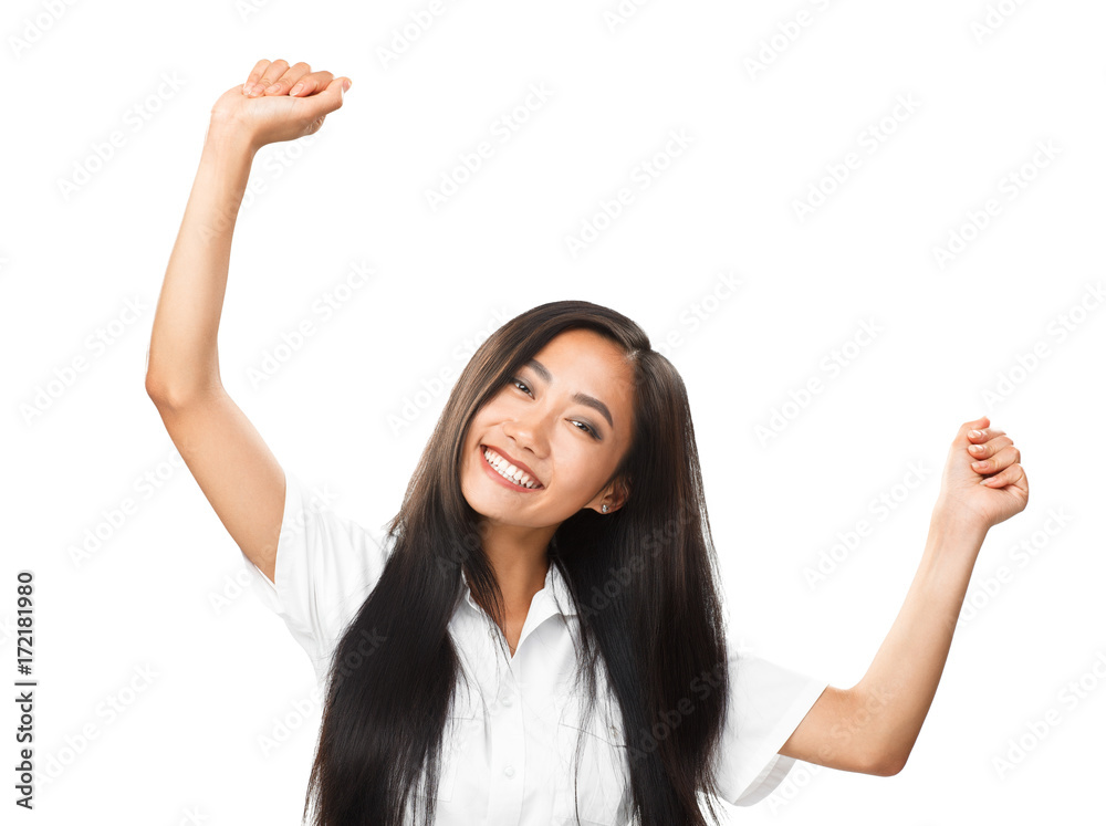 Happy young oriental woman dancing or rejoicing on white background Happy young oriental woman dancing or rejoicing on white background