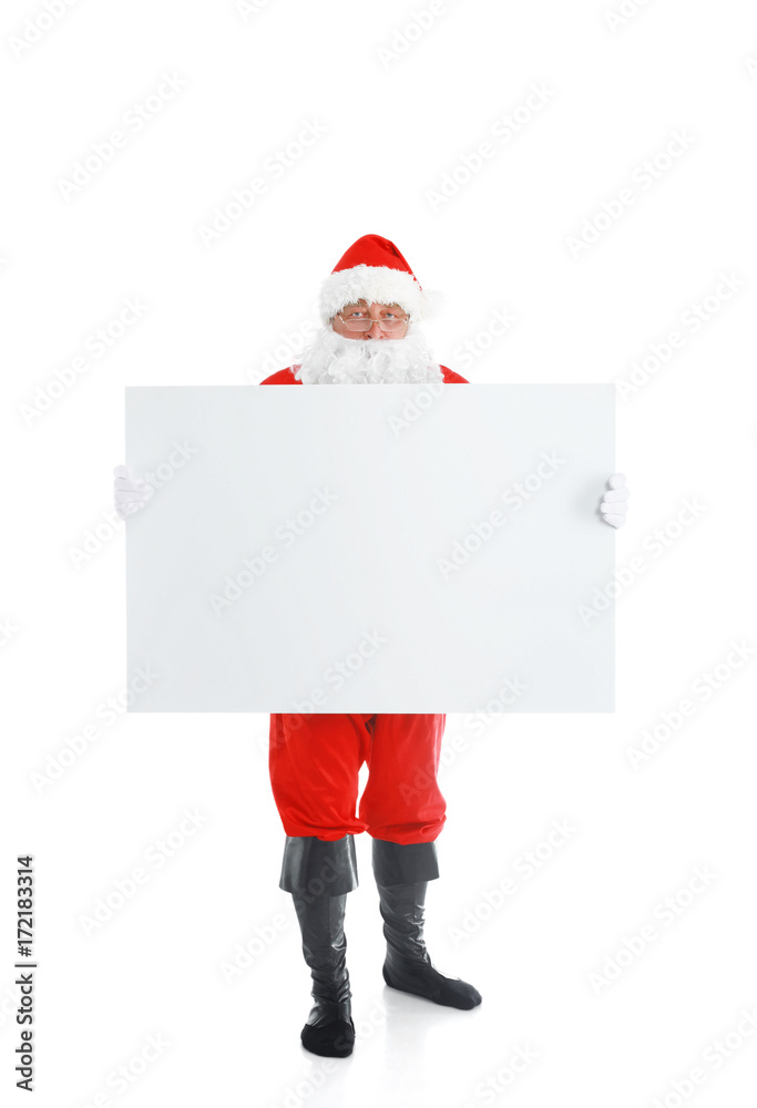 Happy Santa Claus looking out from behind the blank sign isolated on white background Happy Santa Claus looking out from behind the blank sign isolated on white background