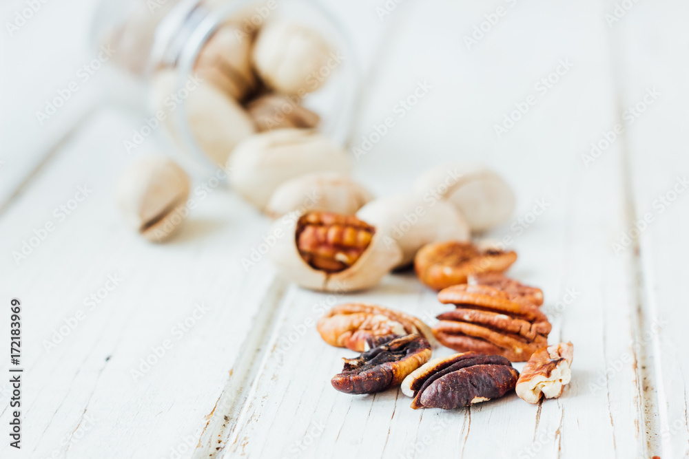 Pecan nuts on white Pecan nuts on white