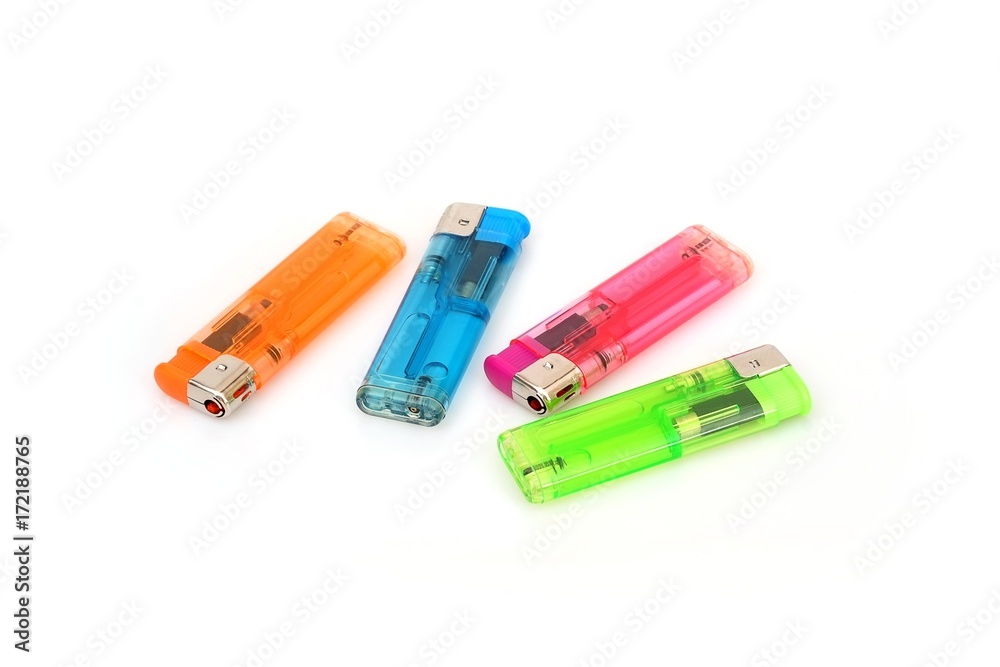 Multi-colored plastic lighters isolated on a white background Multi-colored plastic lighters isolated on a white background