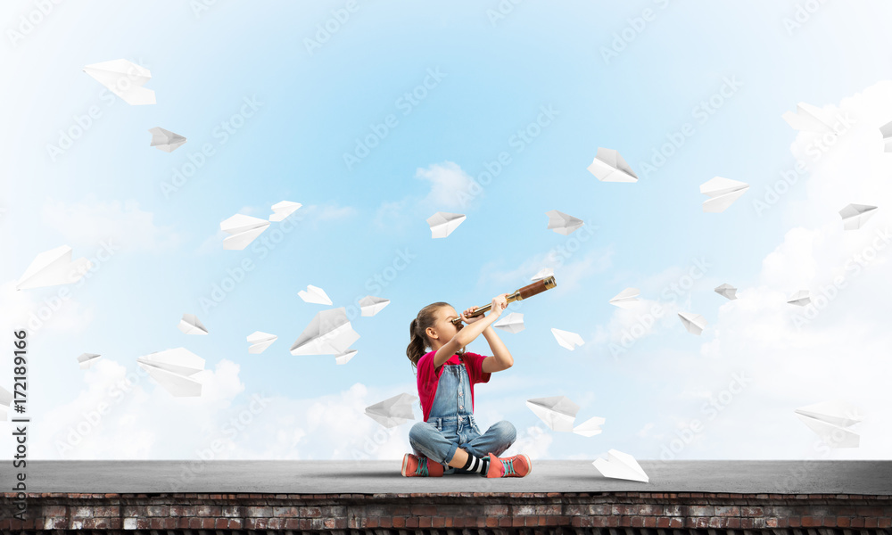 Concept of careless happy childhood with girl exploring this world Concept of careless happy childhood with girl exploring this world