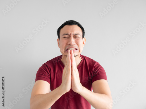 Obraz na plátně Sad man begging for forgiveness.