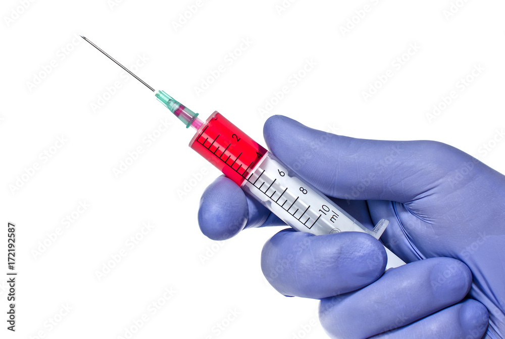 Hand in glove with syringe isolated on a white background Hand in glove with syringe isolated on a white background