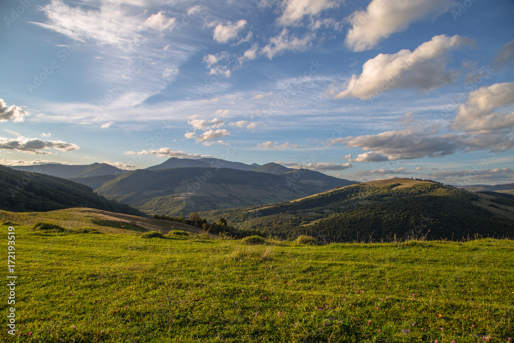 Glade on the background of the mountains are beautiful landscape 