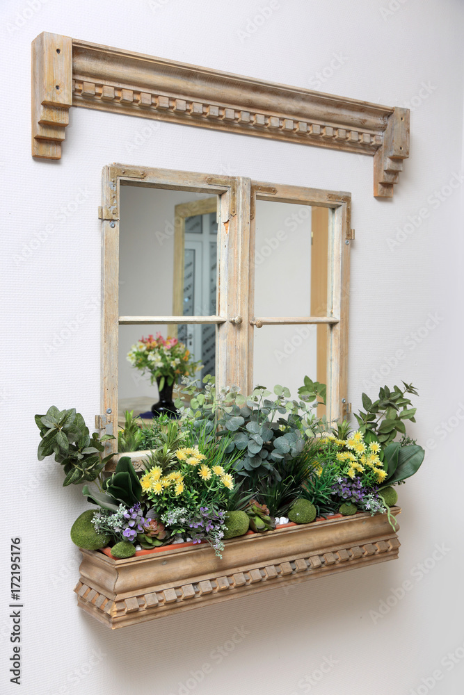 Stare ozdobne okno, piękna donica z kwiatami. - obrazy, fototapety, plakaty 