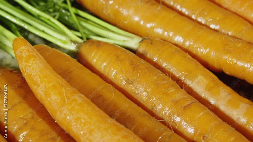 Rotating closeup view of carrots Rotating closeup view of carrots