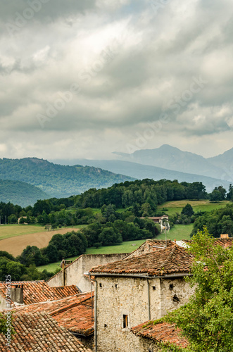 Wallpaper Mural ancient houses in front of mountain landscape Torontodigital.ca