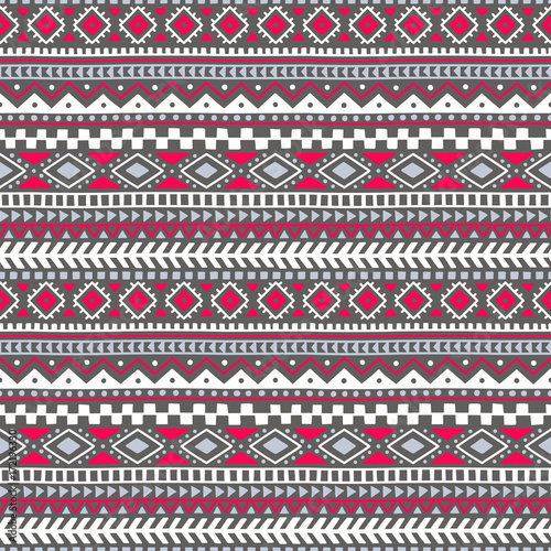 Seamless pattern in the bohemian style. Tribal and ethnic motives. Geometrical ornament. Print for your textiles. Gray, white and pink colors.