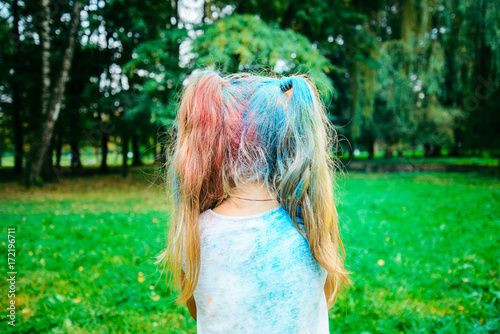 girl with painted hair with holi paints