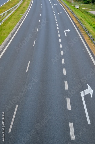 Grey asphalt road. A4 motorway in Poland.
