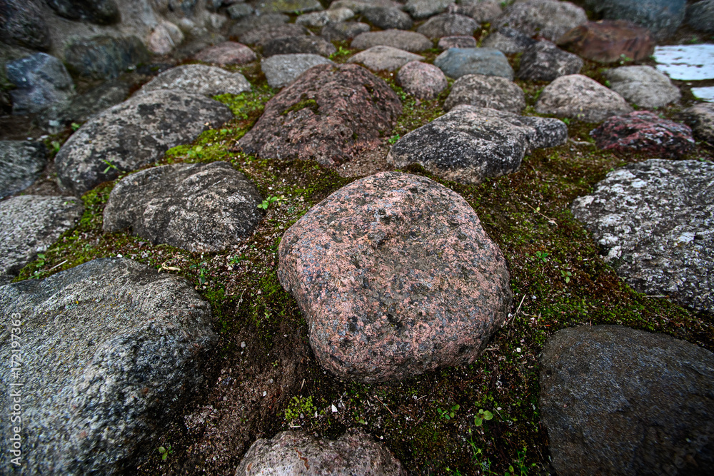 Background of granite boulders and moss