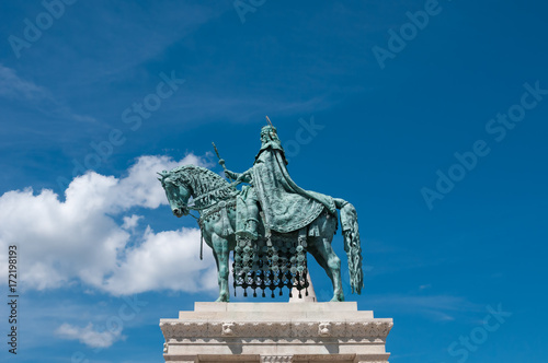 Statue of Stephen I on blue sky background in Budapest, Hungary photo