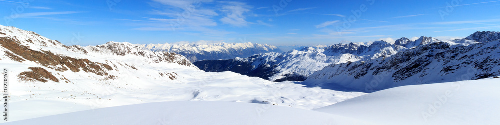 Mountain panorama with snow and blue sky in winter in Stubai Alps, Austria Mountain panorama with snow and blue sky in winter in Stubai Alps, Austria