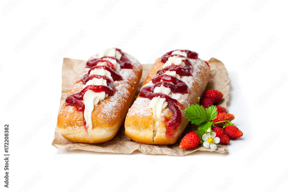 Custard  filled doughnuts with wild strawberry isolated on white
