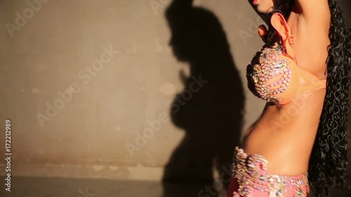 Bellydancer close up and shadow photo