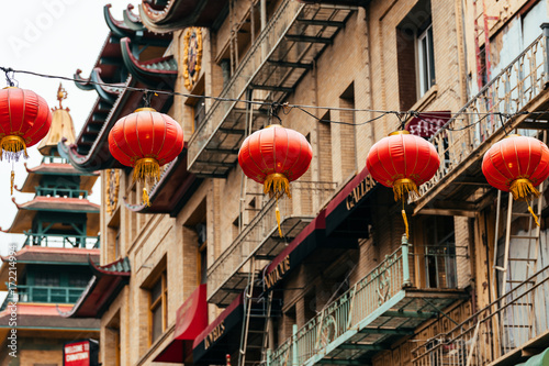 Fototapeta chinese lanterns and fire escape stairs at background