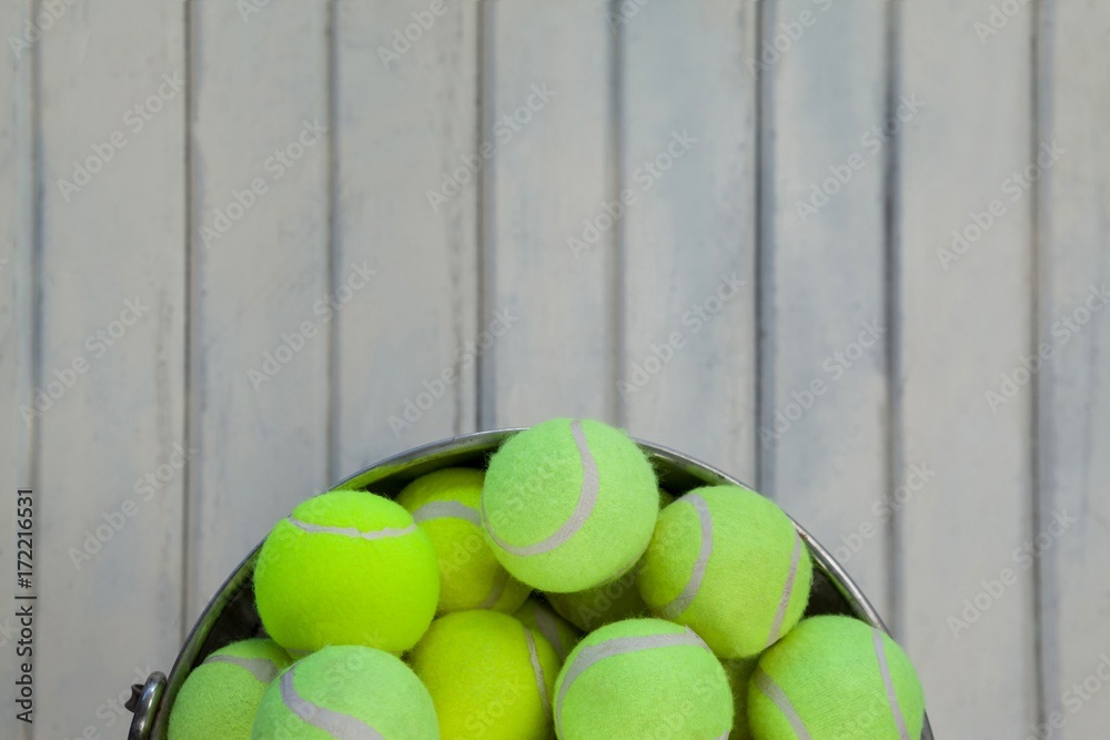 Directly above view of fluorescent yellow tennis balls in