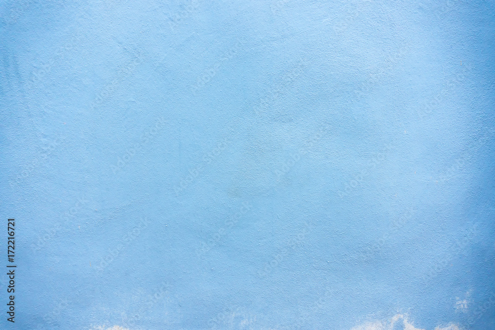 Textures of pastel blue painted grunge concrete background