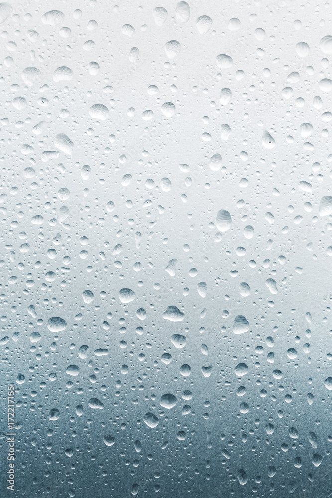 Light rain on the window glass, background Light rain on the window glass, background