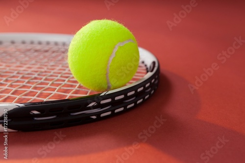 Close up of tennis ball on racket