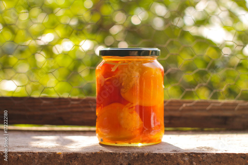 Orange peppers in the jar