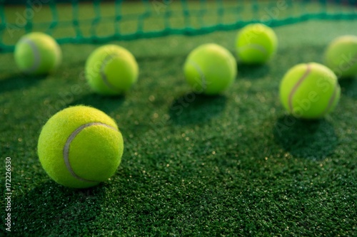 Close up of tennis balls on court