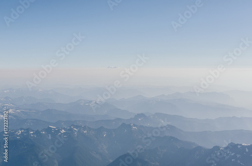 Breathtaking aerial view on mountains in fog