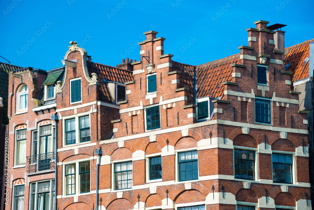 Traditional dutch old buildings in Amsterdam, the Netherlands