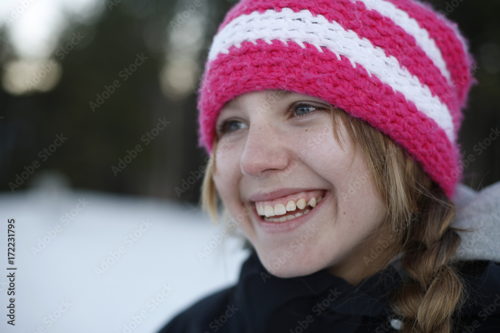 Portrait of a happy young girl in a winter resort Portrait of a happy young girl in a winter resort