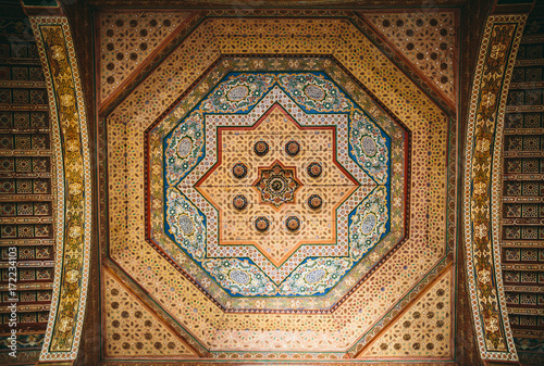 Pattern decorated ceiling in Bahia Palace. Marrakech, Morocco photo