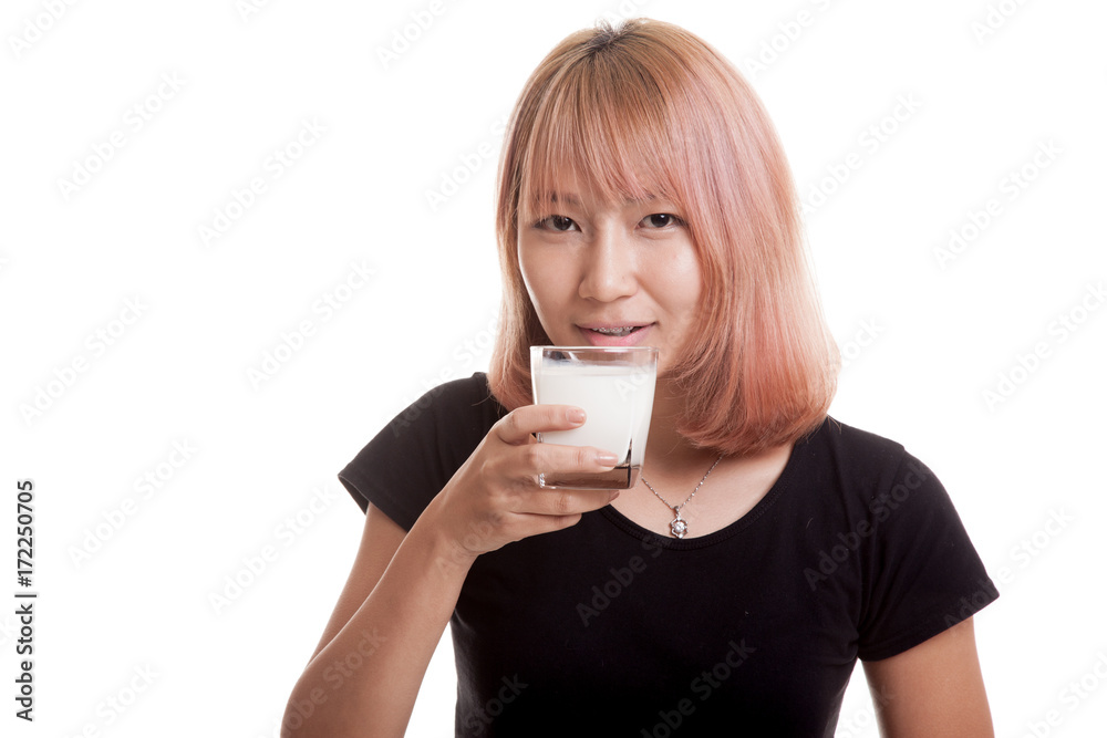 Healthy Asian woman drinking a glass of milk. Healthy Asian woman drinking a glass of milk.