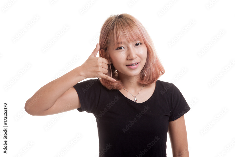 Young Asian woman show with phone gesture. Young Asian woman show with phone gesture.